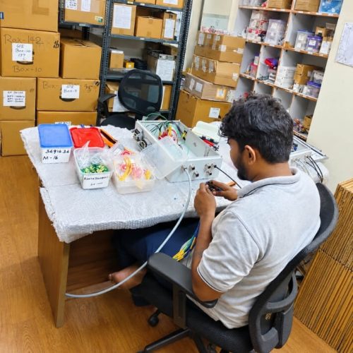 technician assembling wiring
